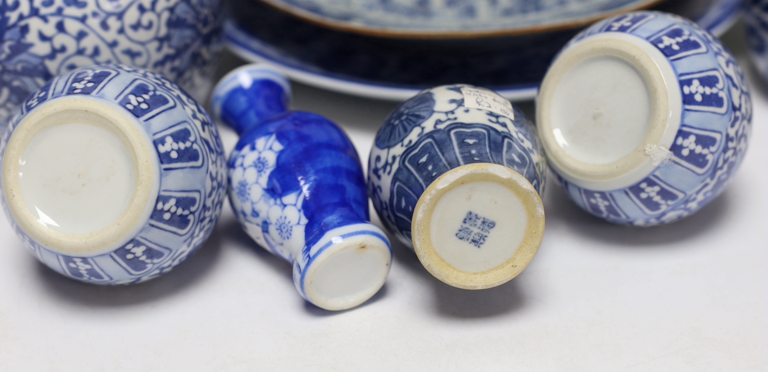 A group of Japanese and Chinese porcelain including an 18th century Chinese export dish, tallest 36cm